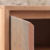 detalle de Buffet de madera maciza con detalle de piedra laminada en las 3 puertas. Mueble para living o comedor